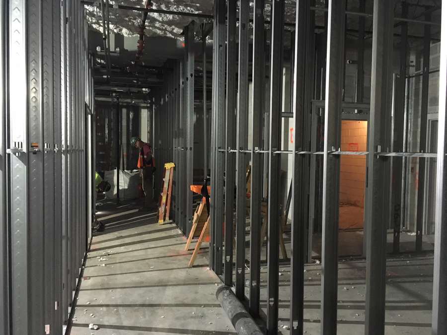 Sample photo: steel studs set to a laser line.